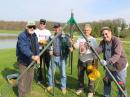 Delaware County ARES tried a number of different configurations, several of them using the ubiquitous military mast sections for support: (L-R) Larry Mittman, N9AUG; Emergency Coordinator Donn Rooks, K8AOK; Dave LeMay, WB2CWJ; Dale Bauer, W8KTQ, and Joe Penzera, N8DRZ.